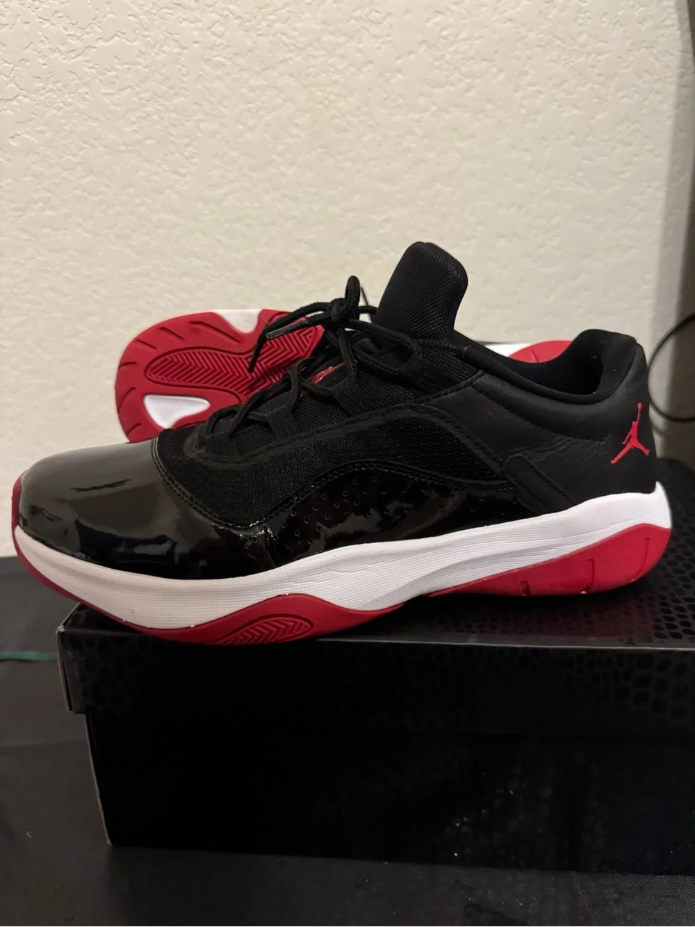Jordan 11 CMFT Bred Black and Red Low-Top Sneakers